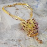 La Petite Robe Jaune pendant necklace with seed beads, Swarovski beads and others.